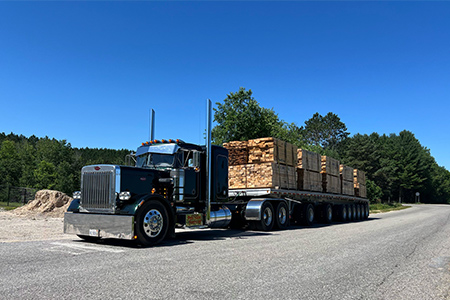 truck hauling lumber from precision hardwoods